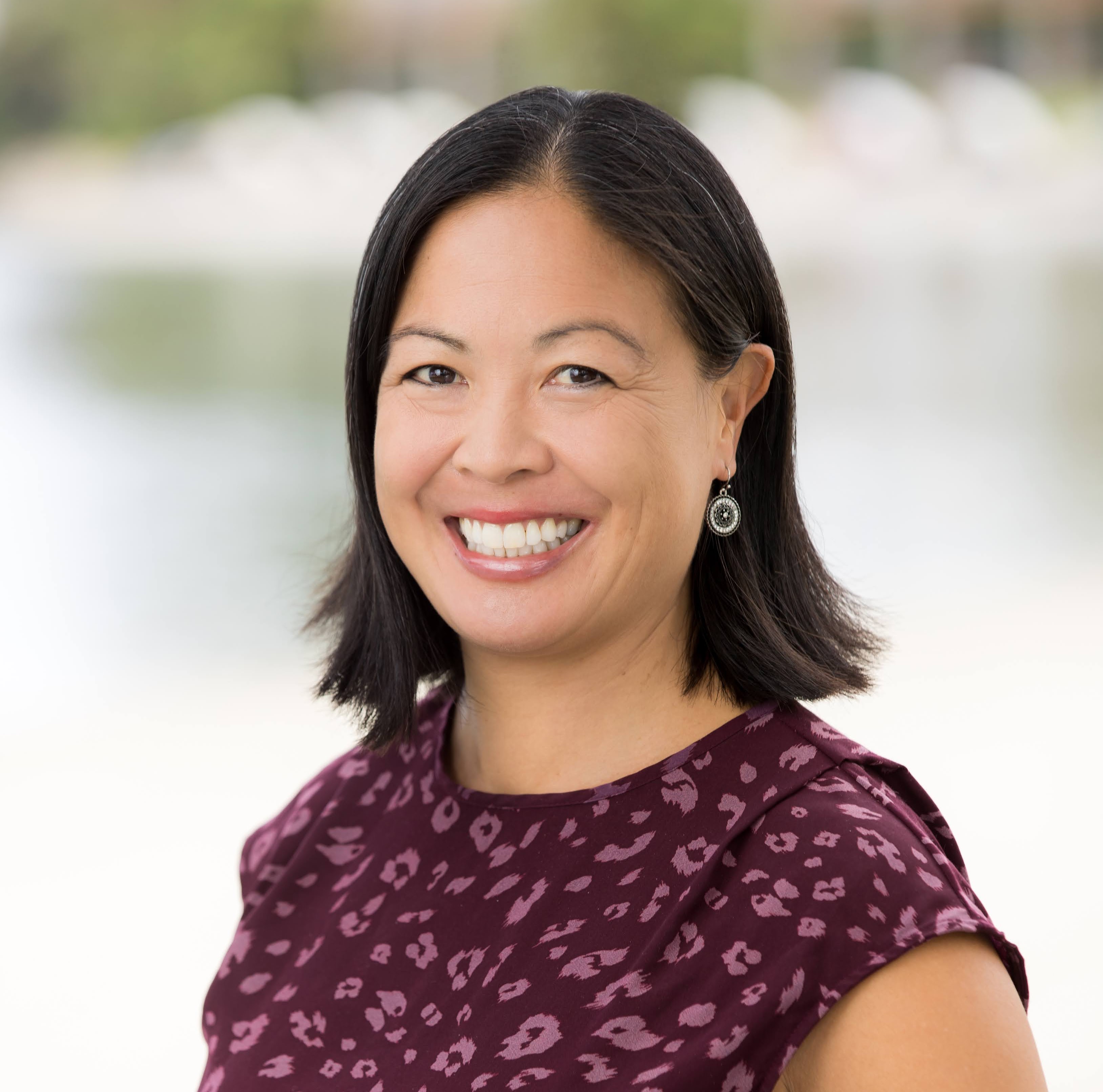 Chinese American Woman with a purple print top