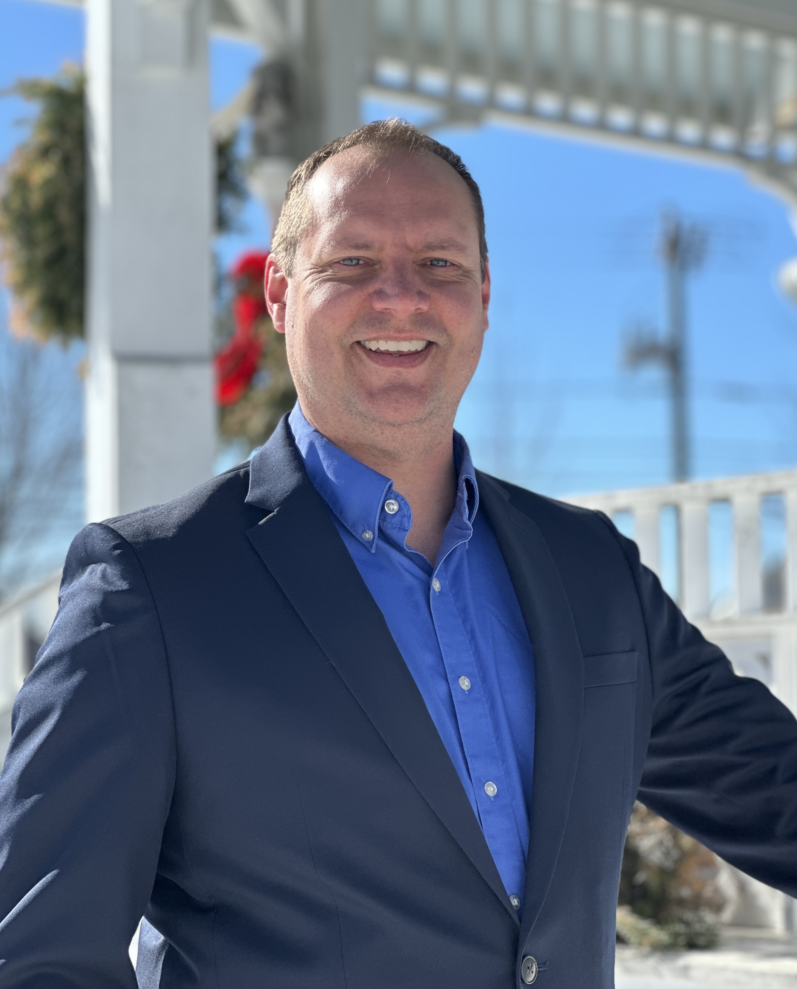 Photo of a man outside with a sport coat